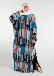 This print Kaftan boasts a full lining, side slits for ease of movement, and a free-flowing design that is ideal for the summer season. For a snugger fit, choose a size down as the Kaftan is designed to be loose-fitting. Paint brush splashes in multicolour, vertical.