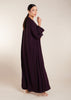 This elegant Two Piece Open Abaya set includes a Full Sleeve matching inner dress. Perfect for everyday wear, it can also be dressed up with accessories for an evening look. The open abaya can be worn as a maxi on its own or paired with the inner dress for a stylish ensemble. In a deep plum purple shade.