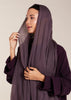 This elegant Two Piece Open Abaya set includes a Full Sleeve matching inner dress. Perfect for everyday wear, it can also be dressed up with accessories for an evening look. The open abaya can be worn as a maxi on its own or paired with the inner dress for a stylish ensemble. In a deep plum purple shade.